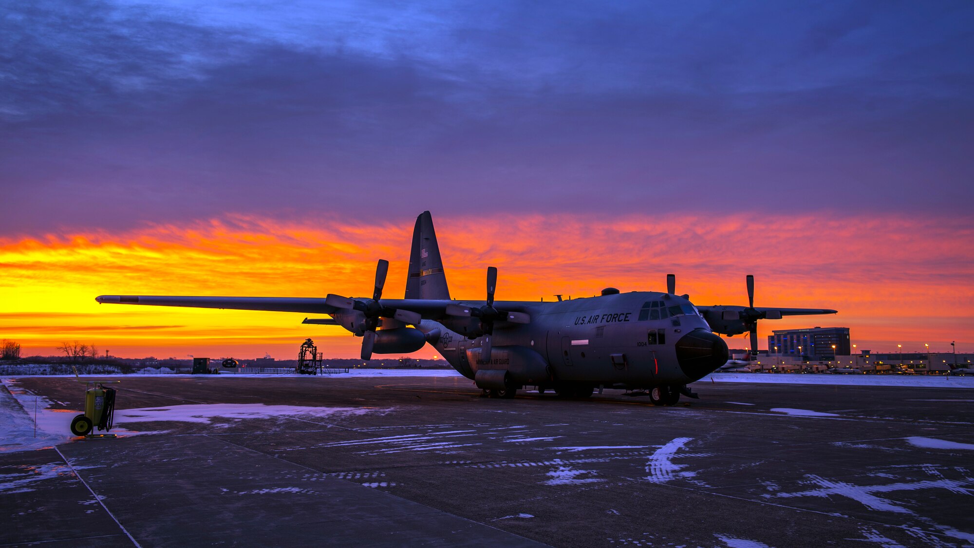 A C-130 Hercules assigned to the 133rd Airlift Wing sits on the flightline