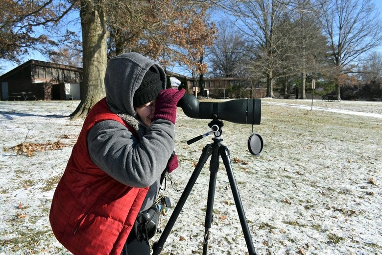A participant using a spotting scope to look for eagles. Hundreds of people attended the second-annual Eagle Fest on Saturday, Jan. 8, which was hosted by the Shenango River Watchers. The event offered visitors an opportunity to learn more about bald eagles that nest around Shenango River Lake, including the river below the dam and nearby wildlife areas (U.S. Army photo by staff).