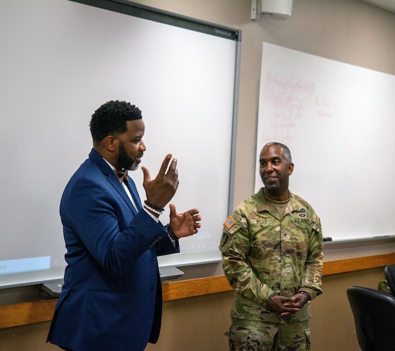 Brig. Gen. Jason Kelly (right), commander for the U.S. Army Corps of Engineers South Atlantic Division, meets with leadership of Boys With A Purpose. Boys With A Purpose is after-school mentoring program and was created to inspire, influence and empower young men to focus on their life's purpose which will help them become productive and effective citizens in the world.