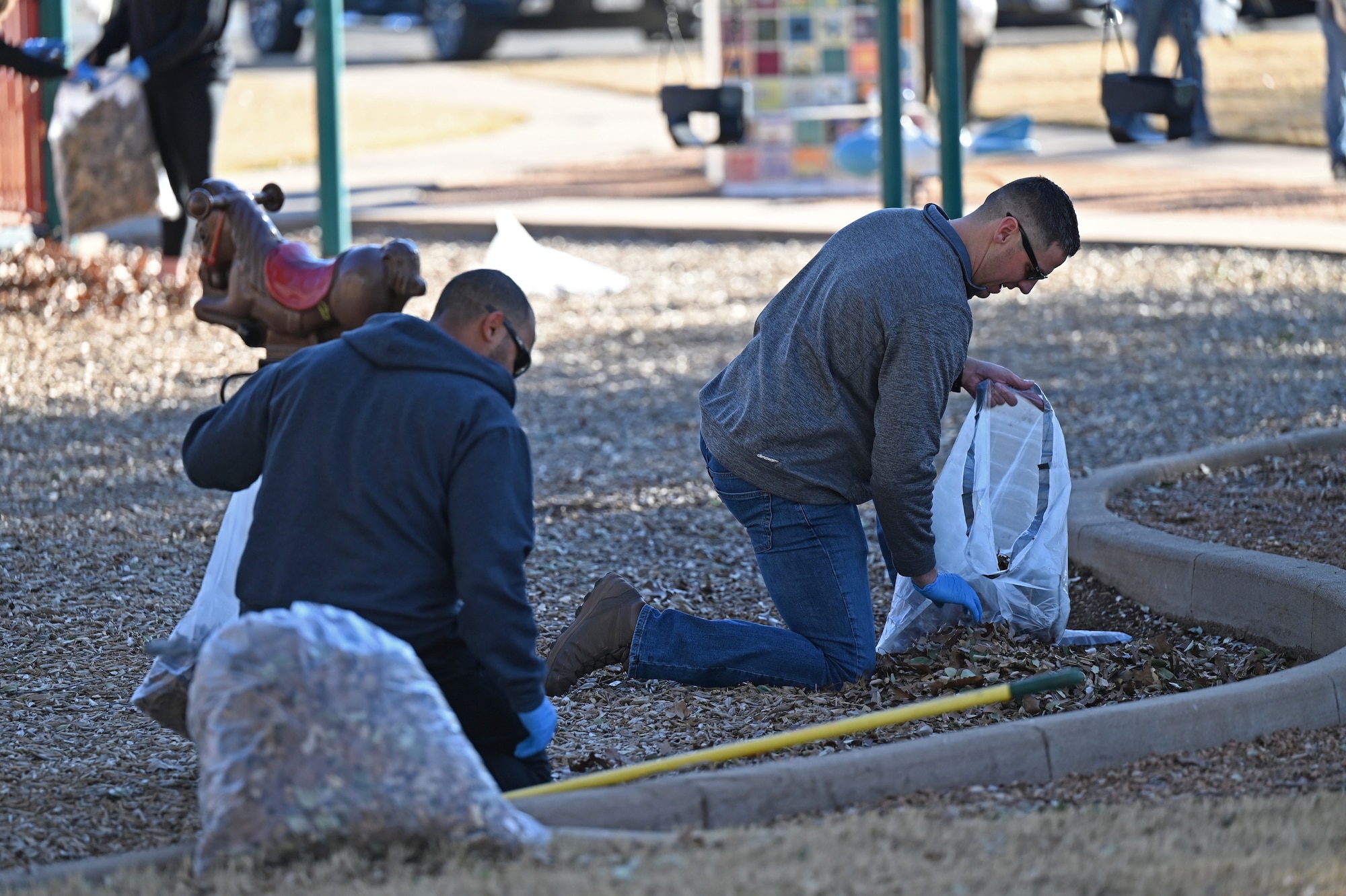 Goodfellow Air Force Base members pick up trash at the Martin Luther King Jr. Memorial Park in San Angelo, Texas, January 17, 2022. Over 20 members from the community gathered to pick up trash and clean up the park.  (U.S. Air Force photo by Senior Airman Ashley Thrash)