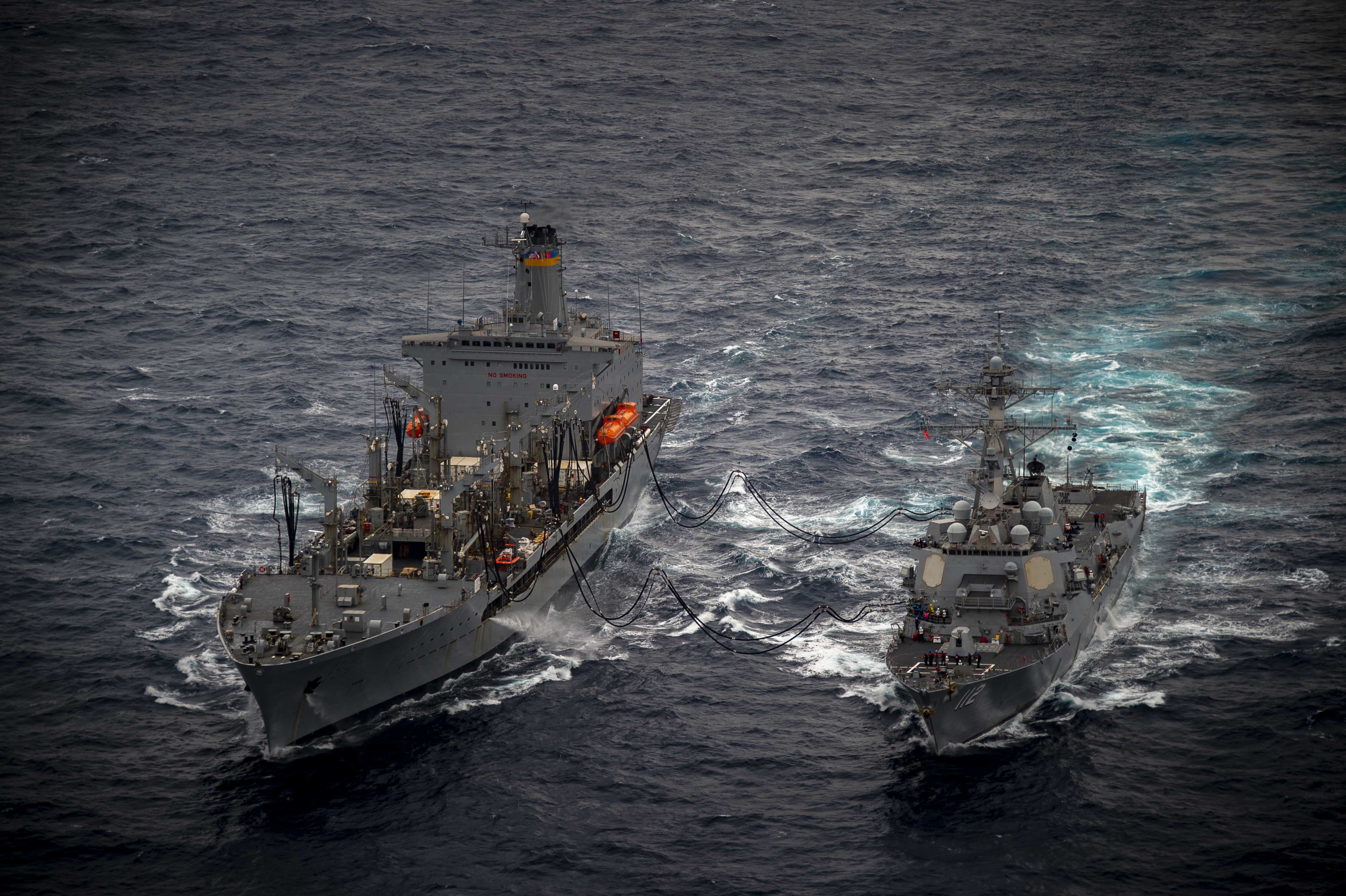 Henry J. Kaiser-class fleet replenishment oiler USNS John Ericsson (T-AO 194) conducts a replenishment-at-sea with Arleigh Burke-class guided-missile destroyer USS Michael Murphy (DDG 112) in the South China Sea, Jan. 13, 2022. Carl Vinson Carrier Strike Group (VINCSG) and Essex Amphibious Ready Group (ESX ARG) are conducting joint expeditionary strike force operations in the South China Sea as part of continuing and routine interoperability training operations in the Indo-Pacific region.