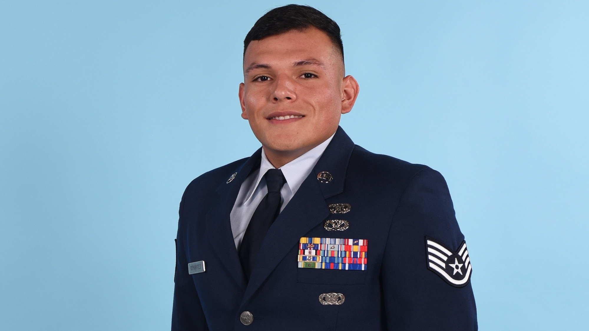 U.S. Air Force Staff Sgt. Samuel Cervantez, 17th Civil Engineer non-commissioned officer in charge of plans and operations for the Office of Emergency Management, poses for an official photo on Goodfellow Air Force Base, Texas, July 27, 2021. Cervantez will attend the University of Oklahoma for the Senior Leader Enlisted Commissioning Program. He will then go to Maxwell Air Force Base, Ala. for Officer Training School. (U.S. Air Force photo by Staff Sgt. Jermaine Ayers)