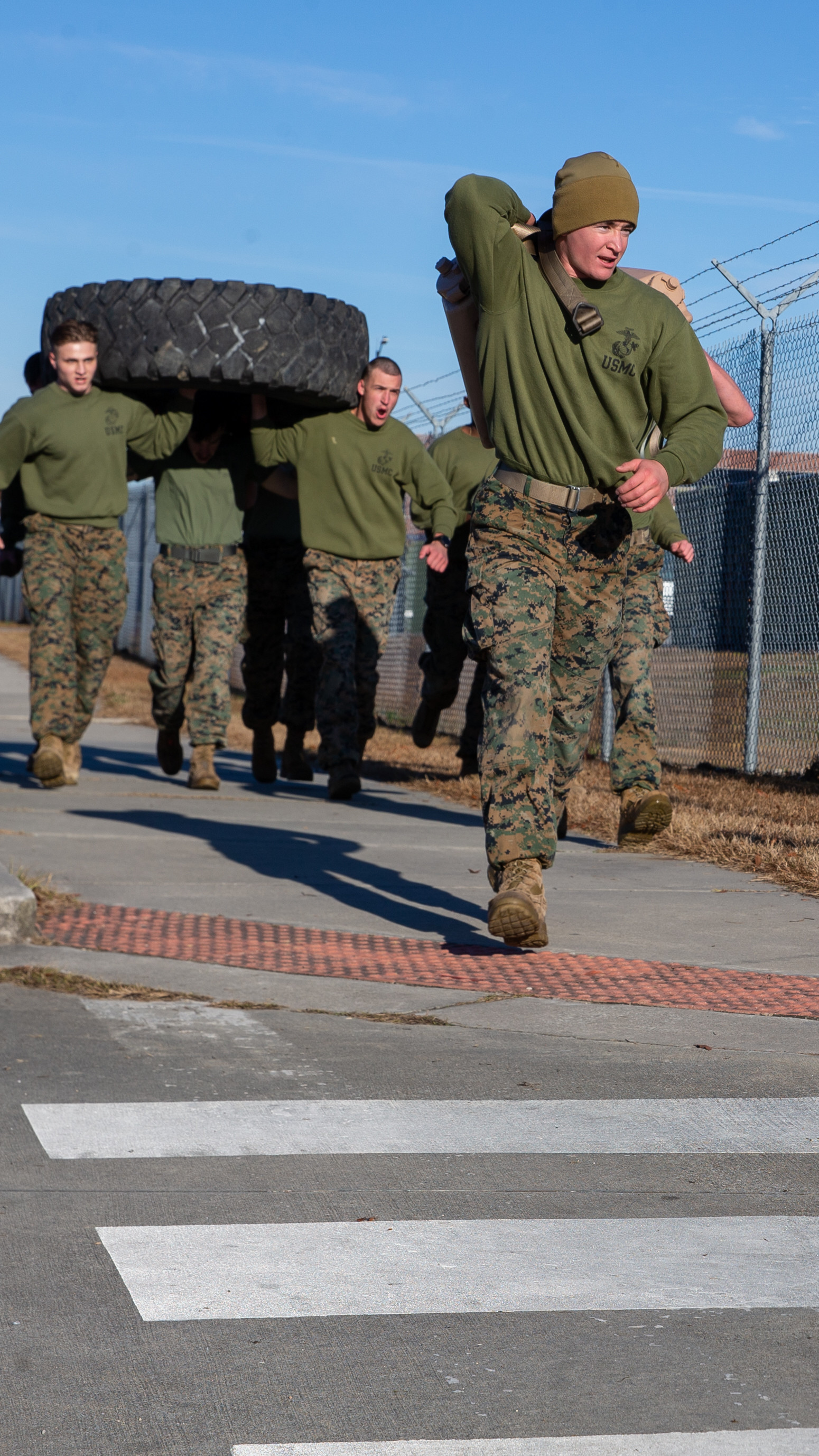U.S. Marines with 2d Battalion, 2d Marine Regiment (2/2), 2d Marine Division, complete a resupply run during the Warlord Games at Camp Lejeune, N.C., Jan. 13, 2022.
