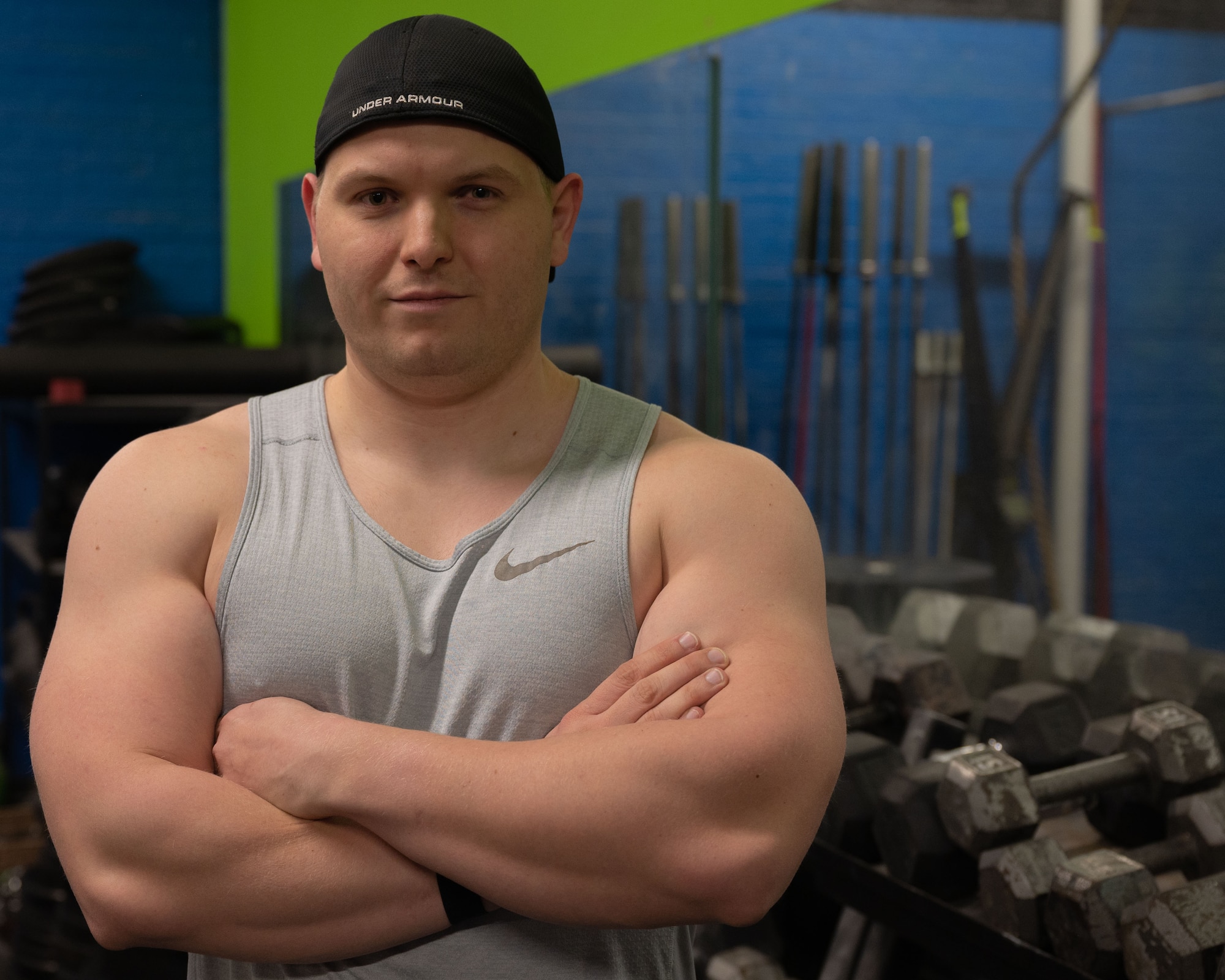 U.S. Air Force Master Sgt. Dalton Grainger, 316th Training Squadron instructor, poses at his local gym, San Angelo, Texas,  January 12, 2022. Grainger has been working on his cardio to prepare for his upcoming fitness assessment. (U.S. Air Force photo by Senior Airman Michael Bowman)