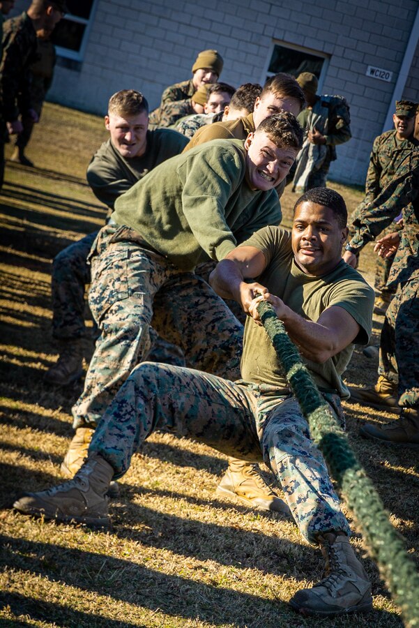 U.S. Marines with 2d Battalion, 2d Marine Regiment (2/2), 2d Marine Division, compete in a game of tug-of-war during the Warlord Games at Camp Lejeune, N.C., Jan. 13, 2022.