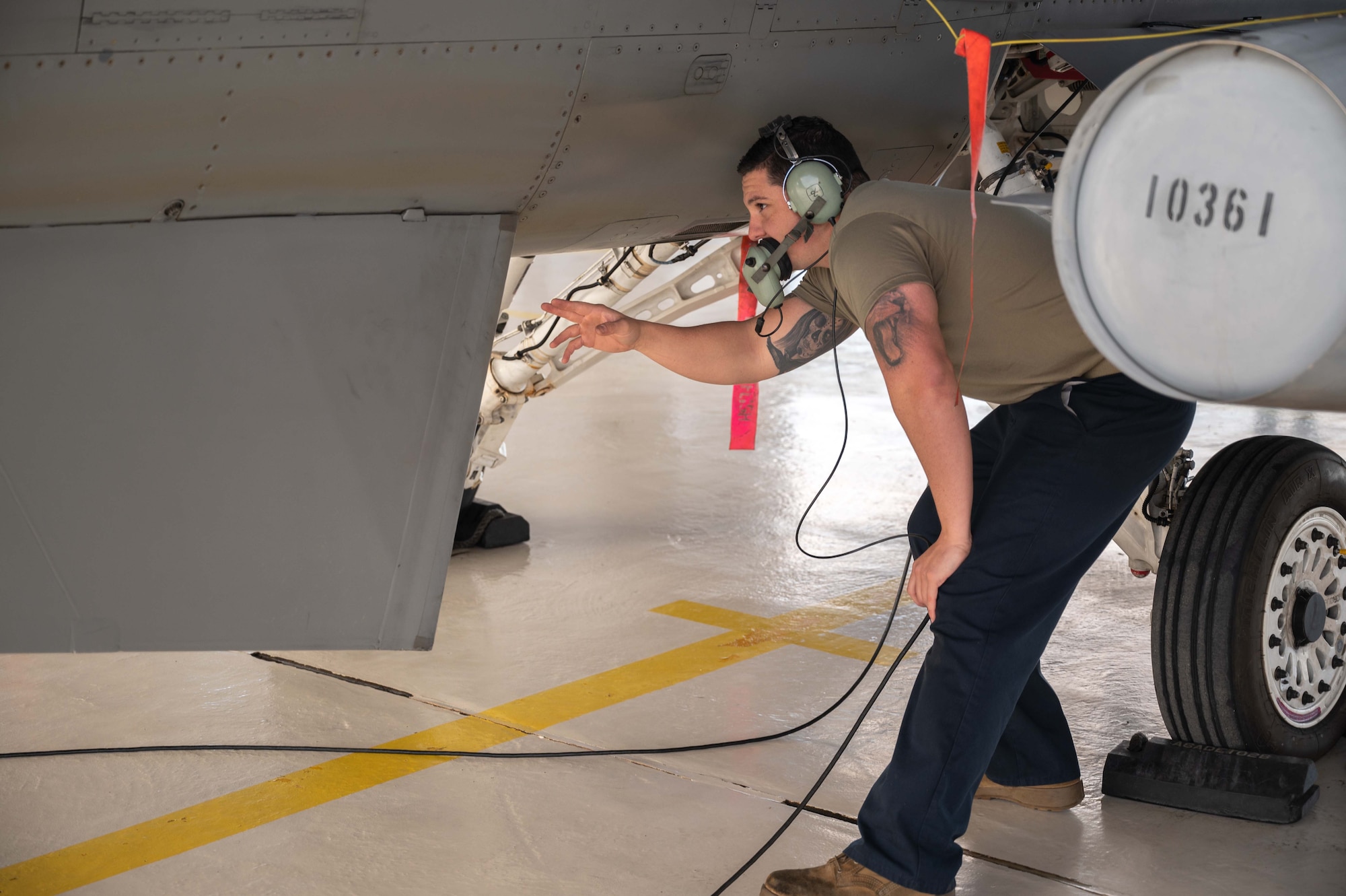 An Airman assigned to Detachment 2, 162nd Wing, prepares an F-16 alert jet for participation in a Western Air Defense Sector (WADS) exercise, dubbed Exercise Felix Hawk, over Southern Arizona on Jan. 18.