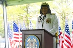 Capt. Zeita Merchant, wearing the female service dress white uniform, relieved Capt. Jason Tama as the commanding officer of Coast Guard Sector New York during a change-of-command ceremony at Sector New York, May 7, 2021. A change-of-command ceremony is a time-honored tradition conducted before the assembled crew, as well as honored guests and dignitaries to formally demonstrate the continuity of the authority within a command. (U.S. Coast Guard Photo by Petty Officer 3rd Class Ryan Schultz)