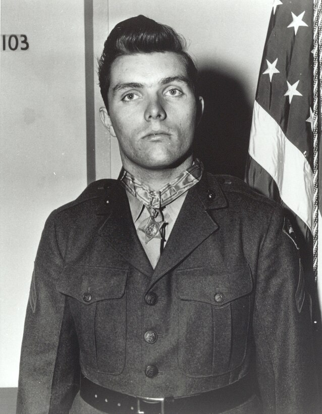 Medal of Honor recipient Pfc. Douglas T. Jacobson poses with the award given by then-president Harry S. Truman at the White House in Washington D.C., Oct. 5, 1945. Jacobson was awarded the medal for his actions during the Battle of Iwo Jima on Iwo To, Japan.