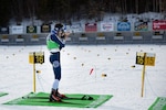 Spc. Thomas Echelberger shoots at the Biathlon Spring Fling on March 3, 2021, at Fort Kent, Maine. Echelberger placed sixth out of 35 competitors.