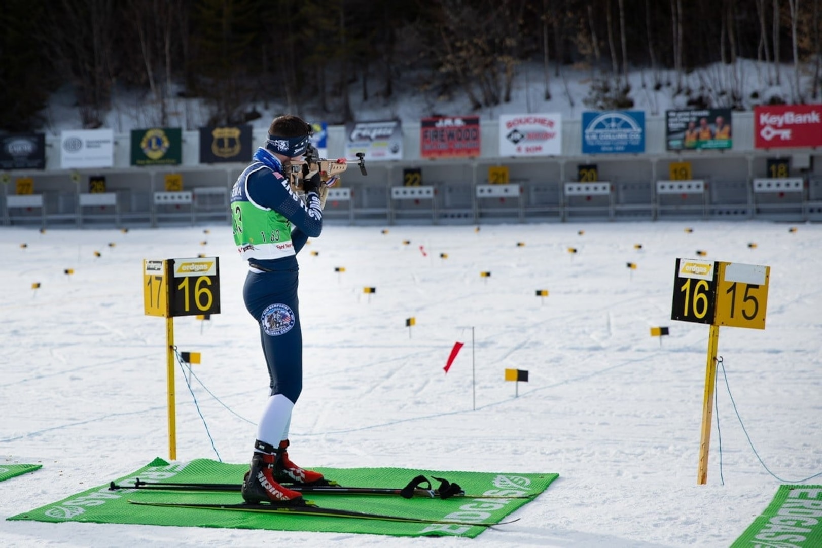 Spc. Thomas Echelberger shoots at the Biathlon Spring Fling on March 3, 2021, at Fort Kent, Maine. Echelberger placed sixth out of 35 competitors.