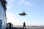 An F-35B Lightning II attached to Marine Fighter Attack Squadron (VMFA) 122 lands aboard amphibious assault ship USS Tripoli (LHA 7), Jan. 11. This is the first time F-35s have operated on Tripoli. Tripoli is underway conducting routine operations in the U.S. 3rd Fleet.