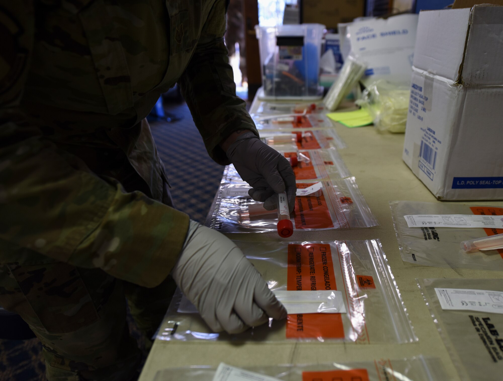 People prepare COVID tests.