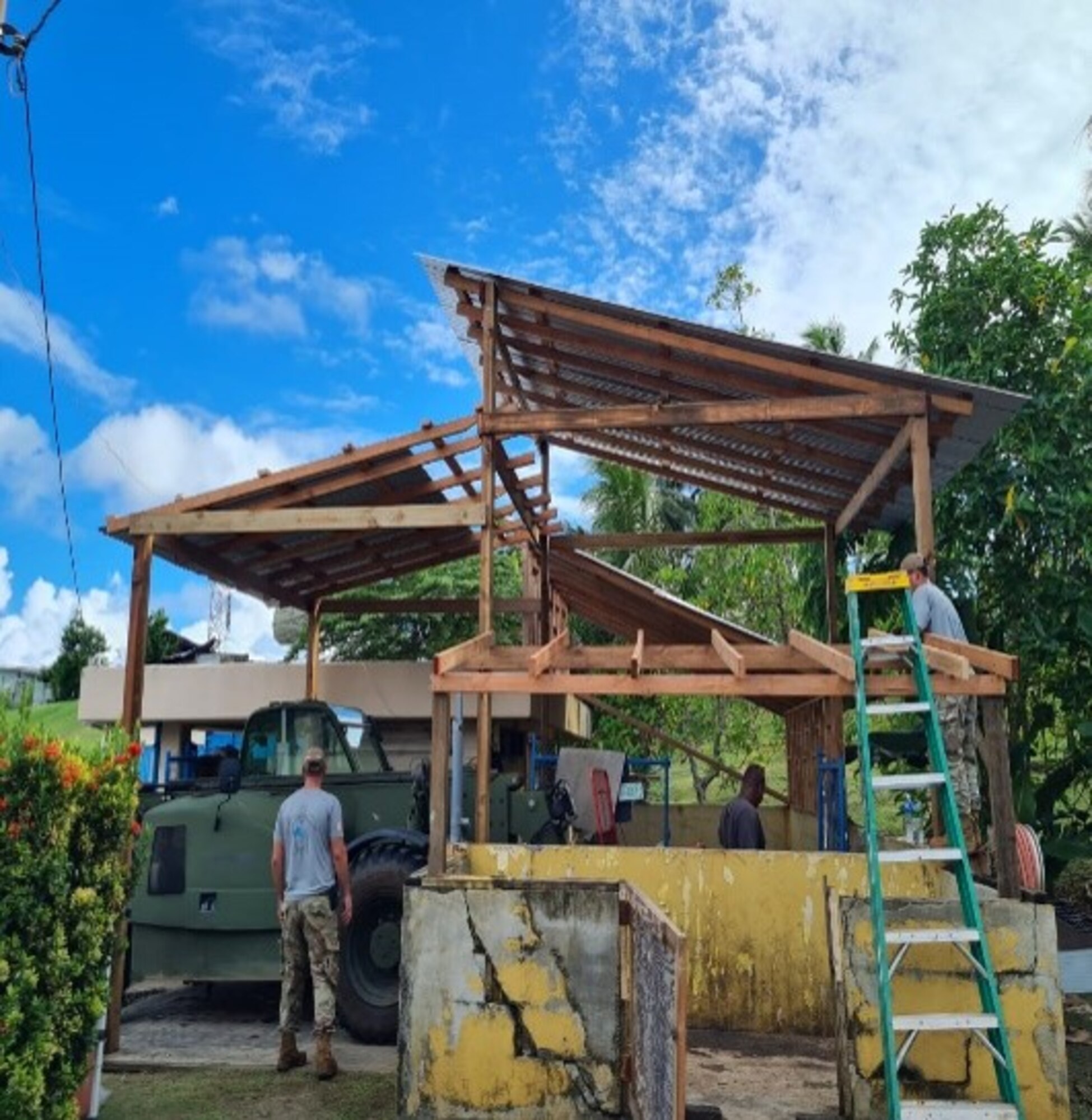 Members from the Civic Action Team- Palau help build a structure in Palau. The CAT is a tri-service deployment to Palau that has been running for over 50 years. The team is from the 36th Civil Engineering Squadron and they have 6 main objectives; Community Construction Projects, Community Relations Projects, Monument Maintenance, Apprenticeship Program, Medical Care and Camp Maintenance. (Courtesy Photo)