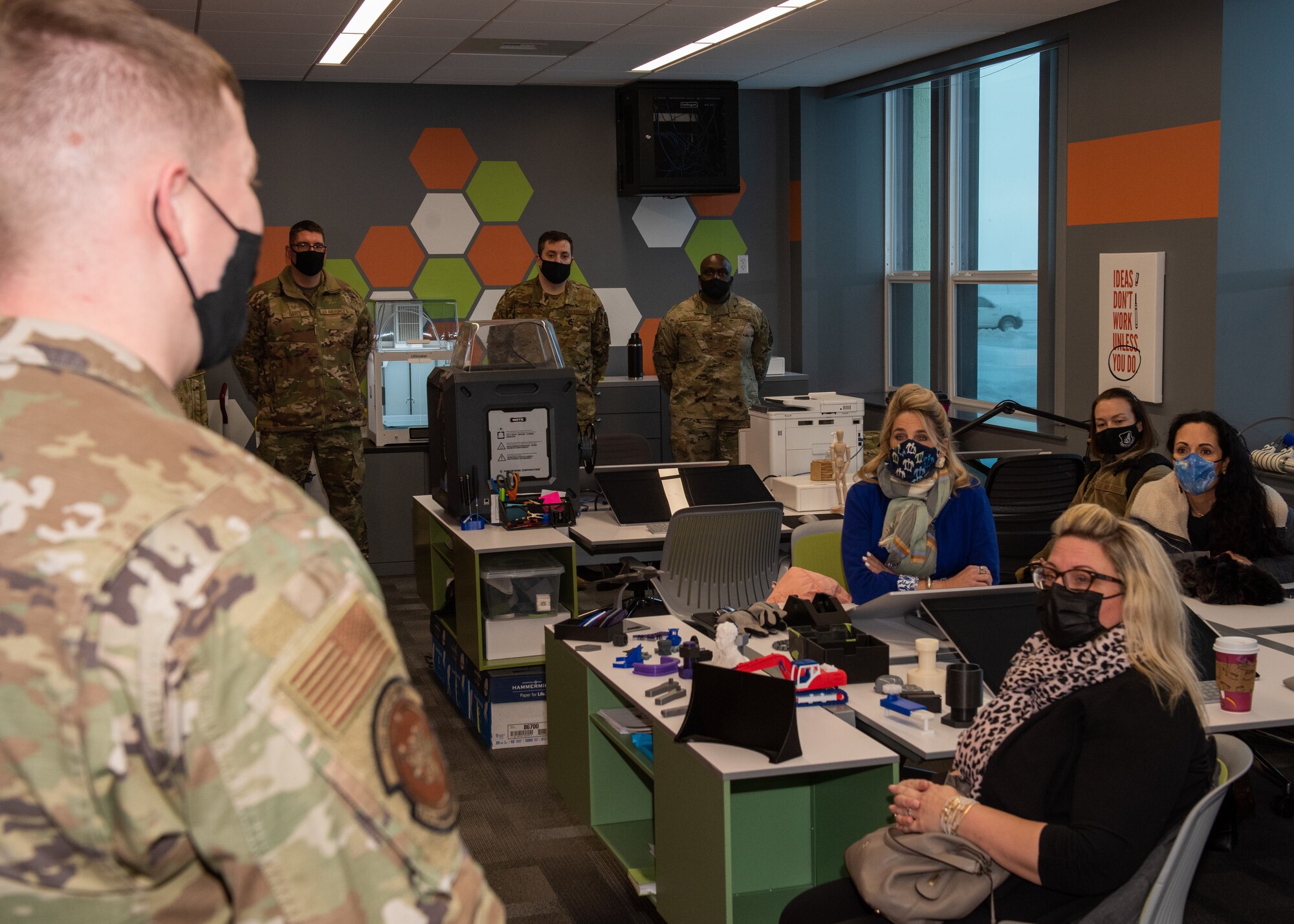 The Joint Base Elmendorf-Richardson Arctic Spark leadership team discusses their mission with PACAF key spouses.