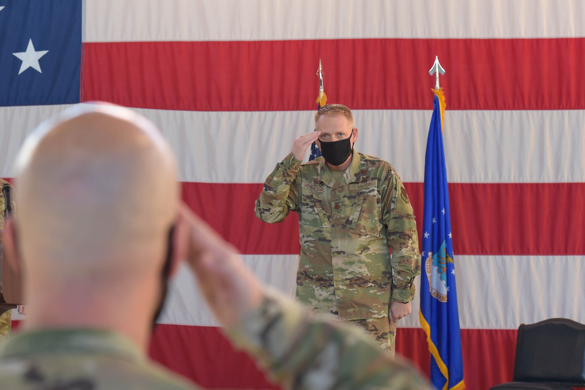 two men saluting