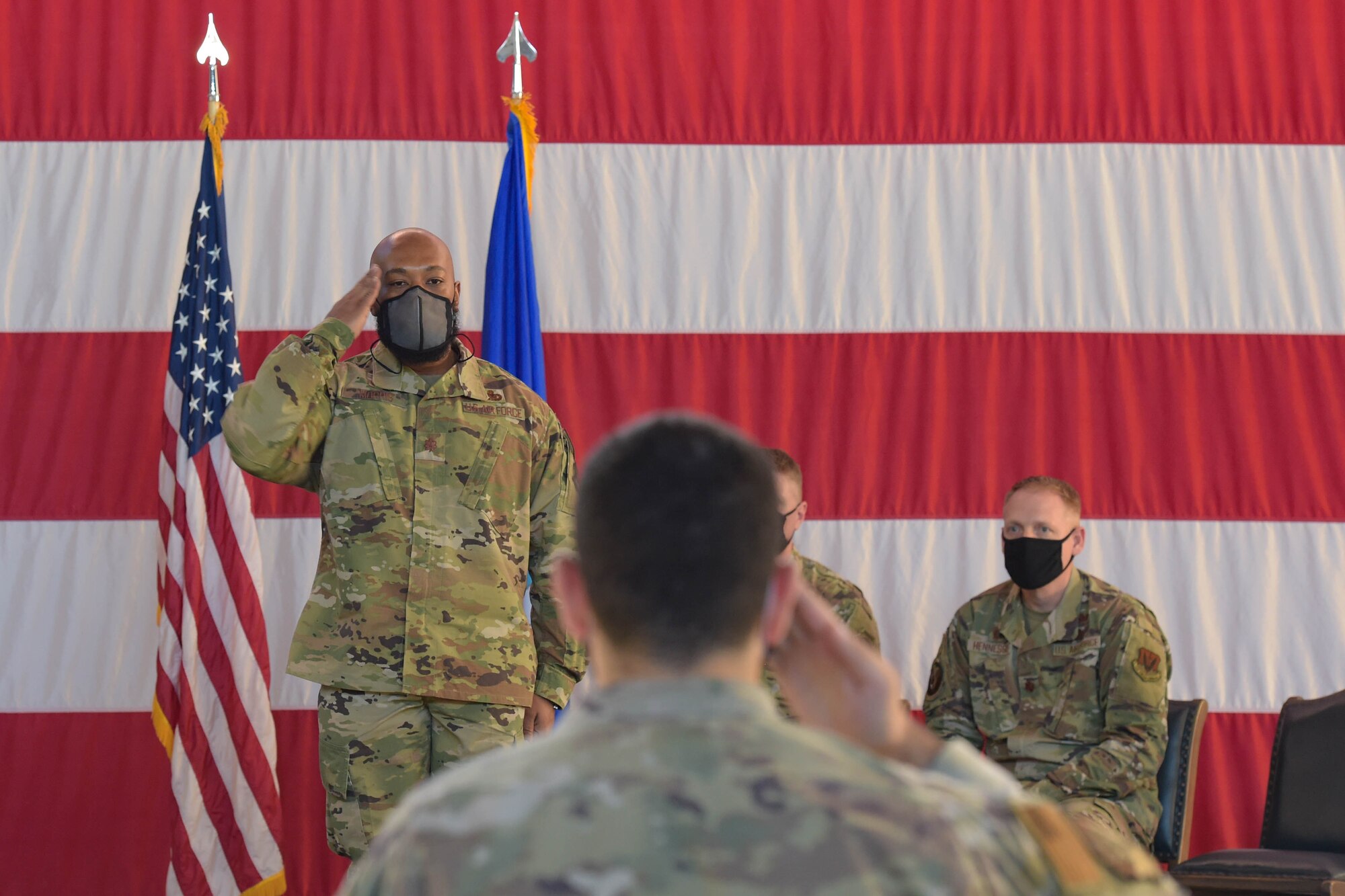 two men saluting