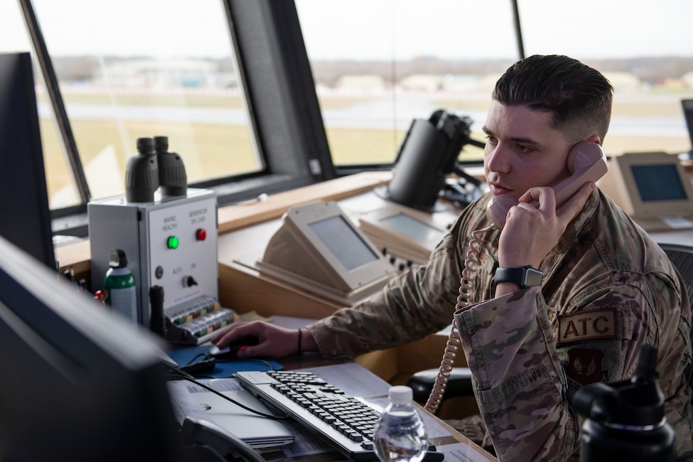 U.S. Air Force Staff Sgt. Troy Ondrey, 420th Expeditionary Air Base Squadron air traffic controller, receives a call from an incoming aircraft at Royal Air Force Fairford, England, Jan. 11, 2022. Members of the 420th EABS, deployed from around the world, work  together with the 420th Air Base Squadron to support various missions at Fairford. From Jan. 8-12, the 420th EABS provided support for the 352nd Special Operations Wing’s Agile Combat Employment exercise. ACE exercises prepare Airmen to operate effectively from locations with varying levels of capacity and support. (U.S. Air Force photo by Senior Airman Jennifer Zima)