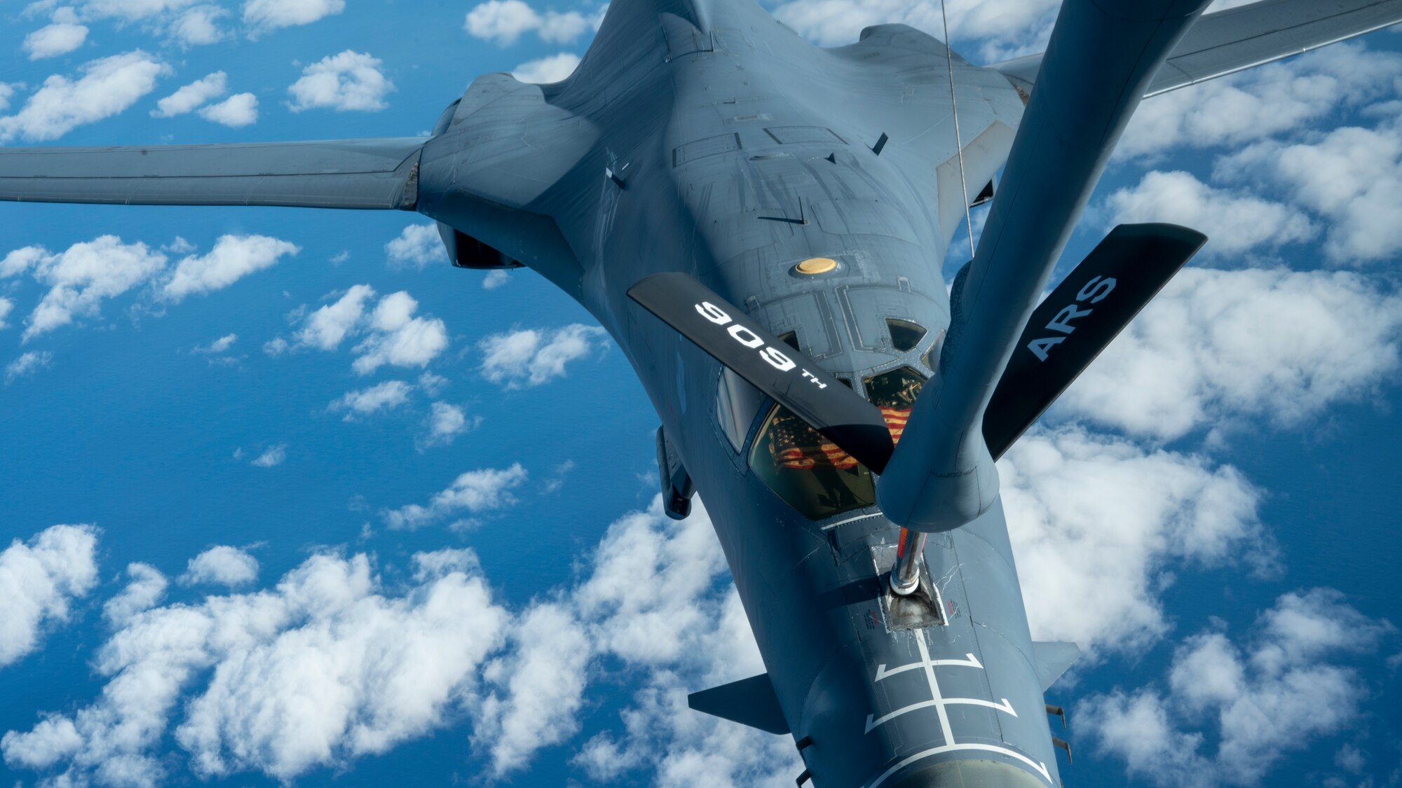 A B-1B Lancer from the 7th Bomber Wing receives fuel from a KC-135R Stratotanker over the Pacific Ocean
