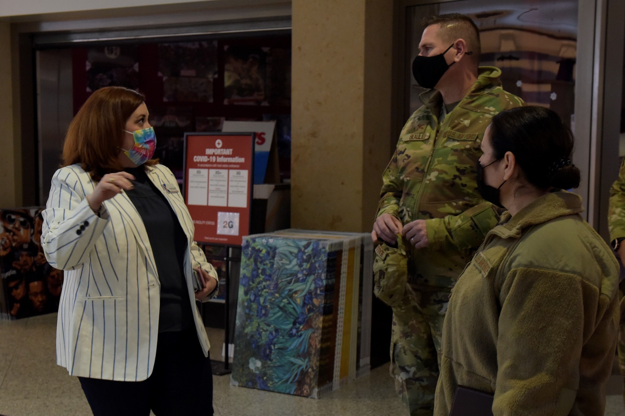 Woman gives a tour of the base exchange