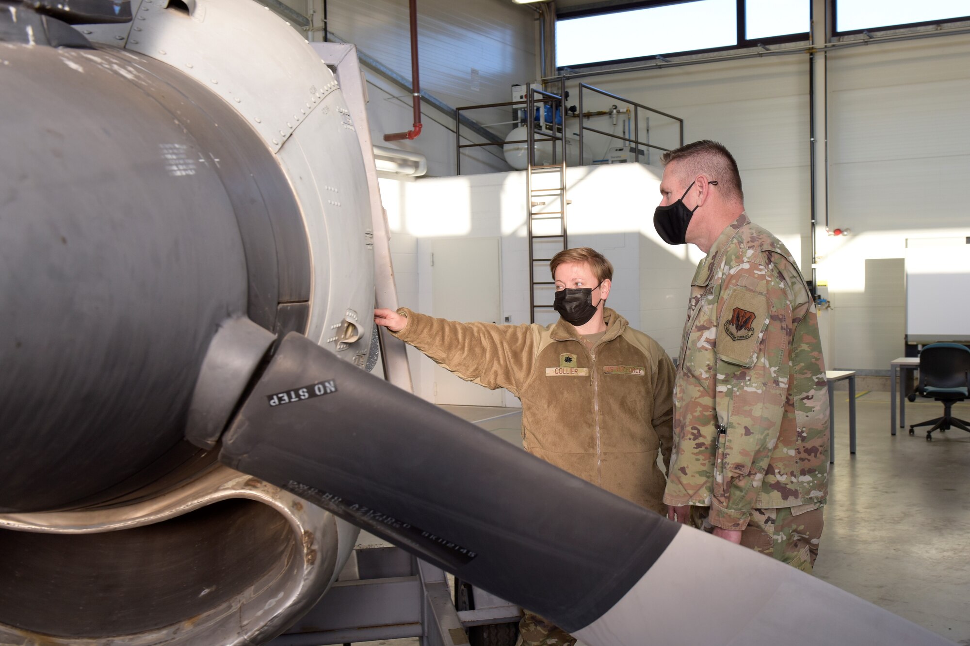 Woman gives a tour of Airframe and Powerplant classroom