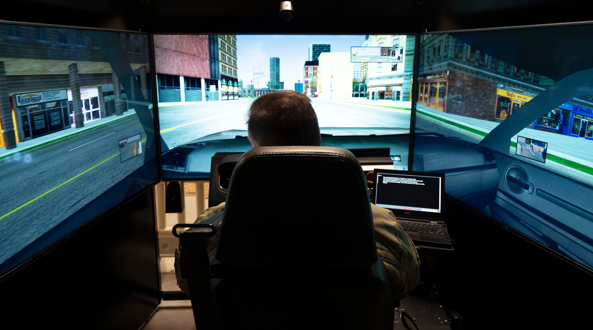 U.S. Air Force Col. Hall Sebren Jr., 72nd Air Base Wing Commander, Tinker Air Force Base, Oklahoma, uses a driving simulator at Ramstein Air Base, Germany, Jan. 12, 2022. Sebren inspected the 569th United States Forces Police Squadron as part of the 2022 Commander-in-Chief’s Installation Excellence Award and inspected their combat readiness and force development including a driving simulator designed to help Airmen from the 569th USFPS improve their ability to perform traffic stops. (U.S. Air Force photo by Senior Airman Thomas Karol)