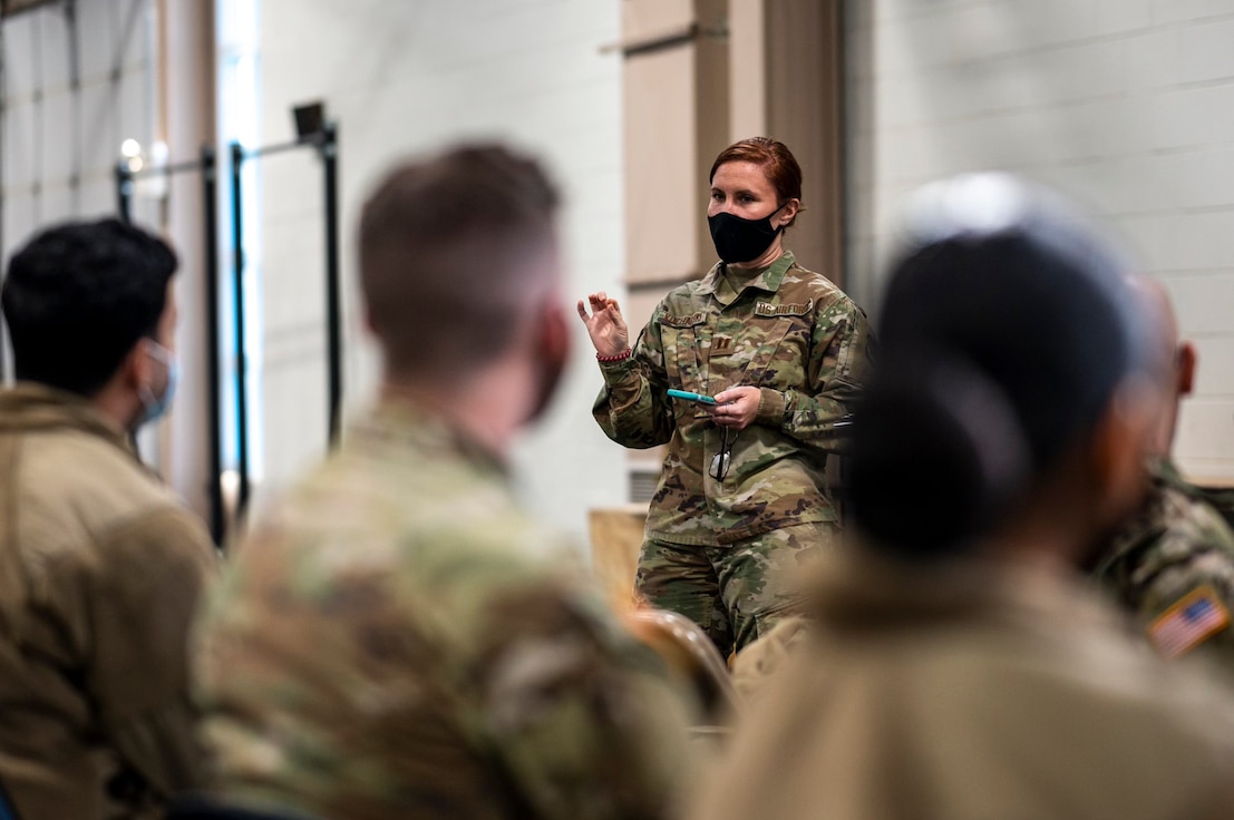 U.S. Air Force Capt. Sara Kucharski, an infectious disease specialist with the New Jersey National Guard, briefs Soldiers assigned to Joint Task Force Covid Guardian on Joint Base McGuire-Dix-Lakehurst, N.J., Jan. 13, 2022.