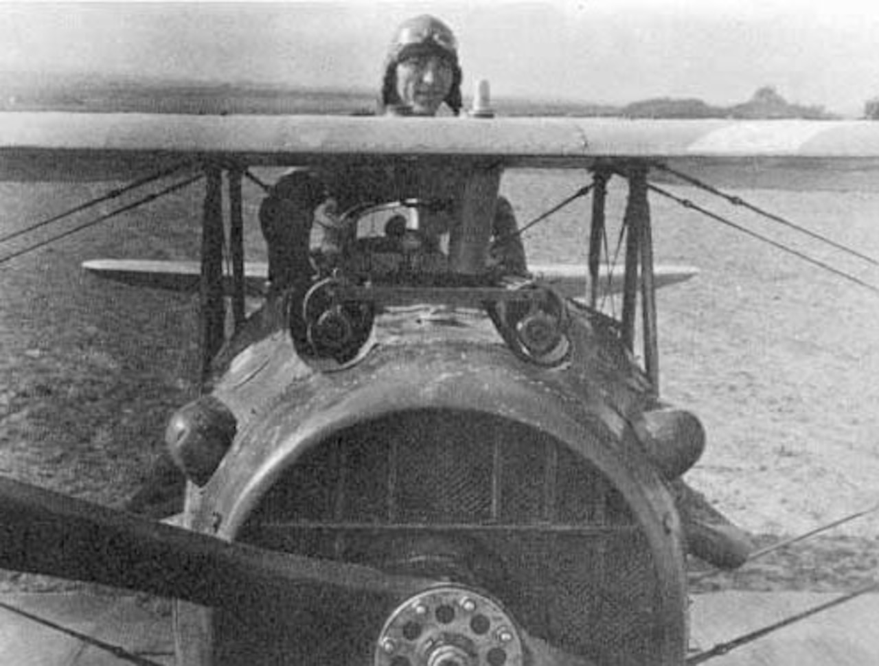 A pilot takes control of an airplane.