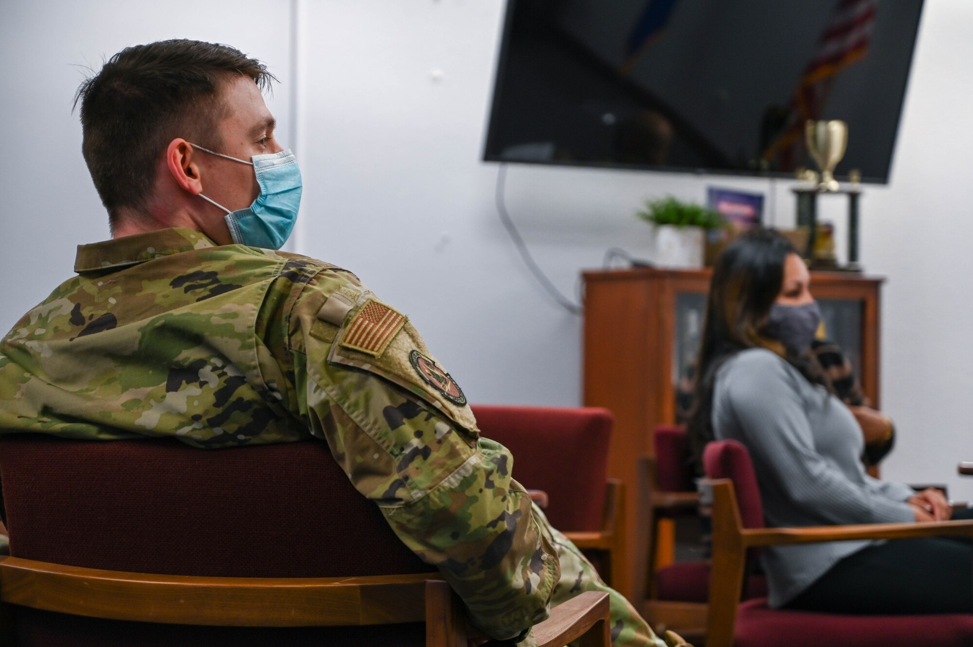 Tech. Sgt. Andrew Thomsen, 97th Logistics Readiness Squadron section chief of commander support staff, listens during an Operation GRIT meeting at Altus Air force Base, Oklahoma, Jan. 19, 2022. This was the first Operation GRIT meeting of the New Year. (U.S. Air Force photo by Senior Airman Kayla Christenson)