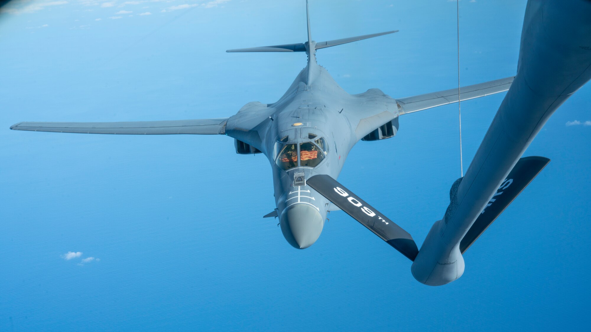 A B-1 Lancer from the 7th Bomber Wing prepares to receive fuel from a KC-135R Stratotanker over the Pacific Ocean