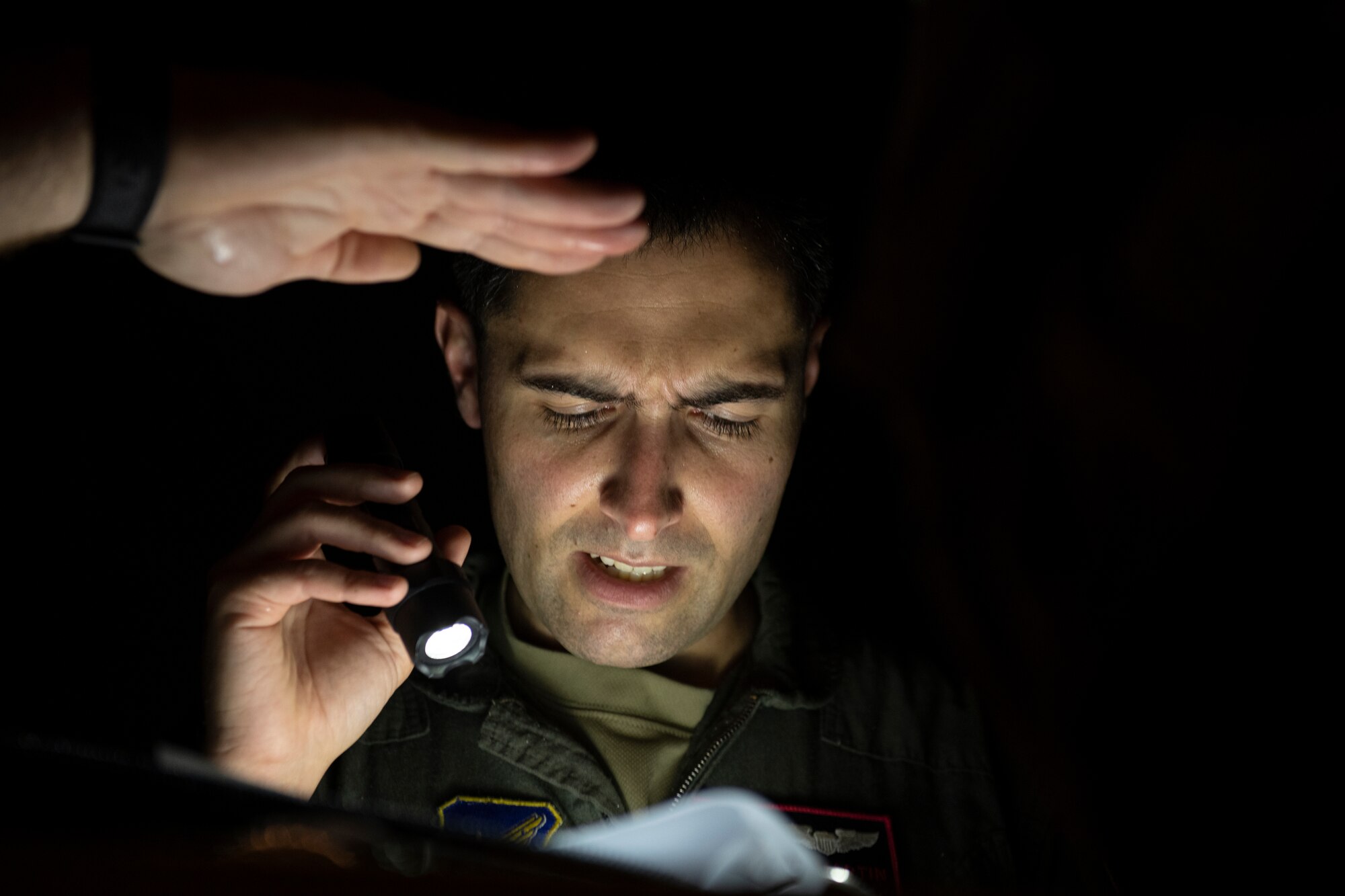 U.S. Air Force Captain Austin Martin, 909th Air Refueling Squadron aircraft commander, conducts a pre-flight inspection in support of a Bomber Task Force deployment at Kadena Air Base