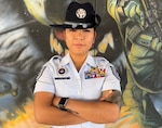 Tech. Sgt. Eileen Echaluse, a Master Military Training Instructor at the 331st Training Squadron, poses for a photo in front of the 331st TRS mural at Joint Base San Antonio-Lackland, Texas, Jan. 13, 2022. Echaluse, a native of Saipan, is the first member of her family to enlist in the U.S. Air Force. Echulase is also the non-commissioned officer of Military Drill and Ceremonies for the 331st TRS. (Courtesy photo by Tech. Sgt. Monica Braden)