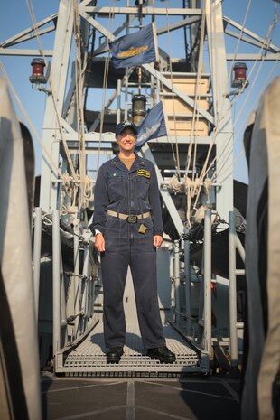 220112-A-AI379-1018 NAVAL SUPPORT ACTIVITY BAHRAIN (Jan. 12, 2022) Lt. Cmdr. Brittany Lynn, commanding officer of patrol coastal ship USS Sirocco (PC 6), poses for a photo aboard the ship. Sirocco’s crew, commanded by Lynn, safely rescued five mariners in the Gulf of Oman when their fishing vessel exploded, Dec. 15, 2021. (U.S. Army photo by Cpl. DeAndre Dawkins)