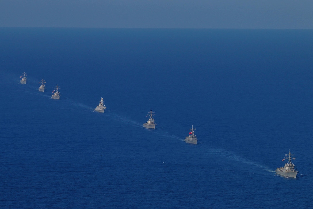 U.S., Turkish and Italian ships sail in formation.