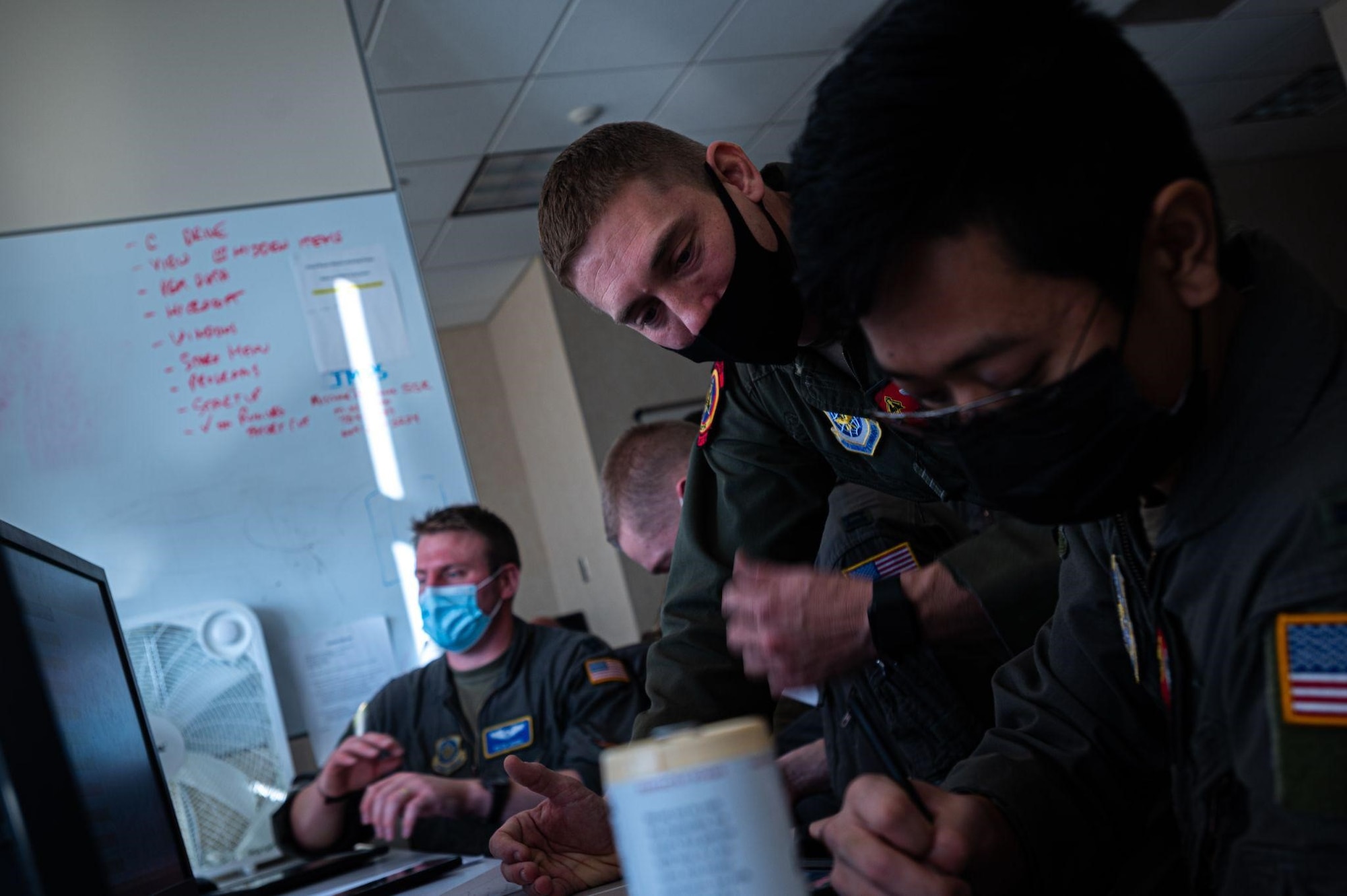 Instructor speaks to student