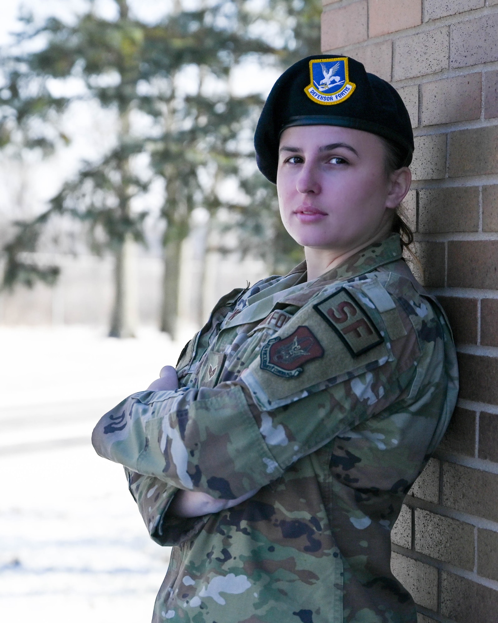 Senior Airman Viktoria Senkiv, a fireteam member assigned to the 910th Security Forces Squadron, poses for a photo outside Youngstown Air Reserve Station’s Combat Arms Training and Maintenance firing range, Jan. 8, 2022.