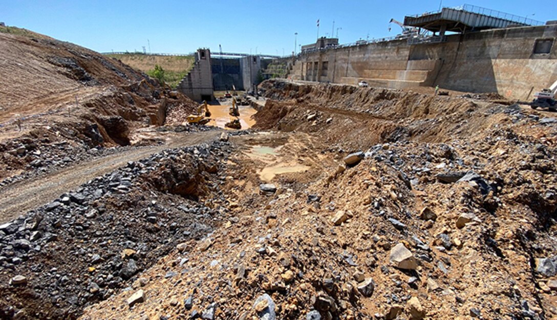 Construction crews excavate at the Kentucky Lock Addition Project in Grand Rivers, Kentucky. The U.S. Army Corps of Engineers Nashville District has received funding from the Infrastructure Investment and Jobs Act to complete the project. (USACE Photo by Lee Roberts)