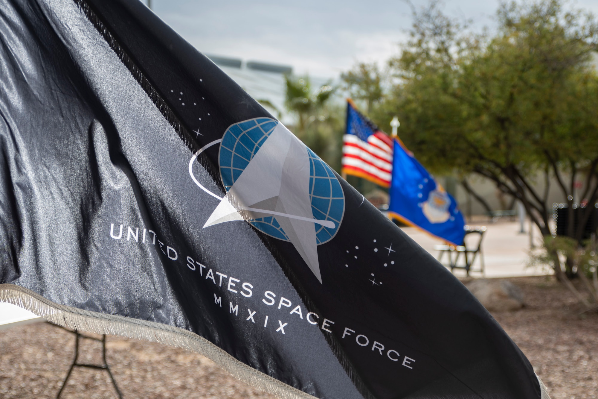 U.S. Space Force flag waves in the wind.
