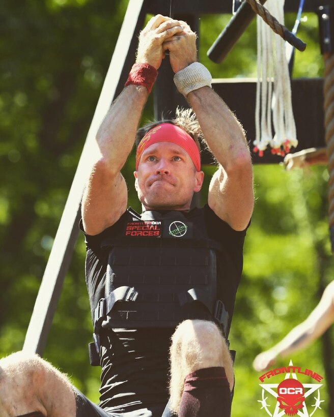 Lt. Col. Christopher Hoover, staff judge advocate, Marine Corps Logistics Base Albany, notoriously pushes himself past obstacles, physical pain and mental toughness to compete in obstacle course races all around the country.