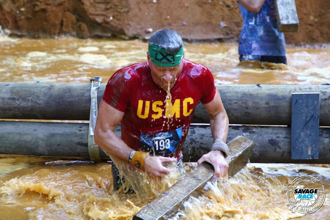 Lt. Col. Christopher Hoover, staff judge advocate, Marine Corps Logistics Base Albany, notoriously pushes himself past obstacles, physical pain and mental toughness to compete in obstacle course races all around the country.