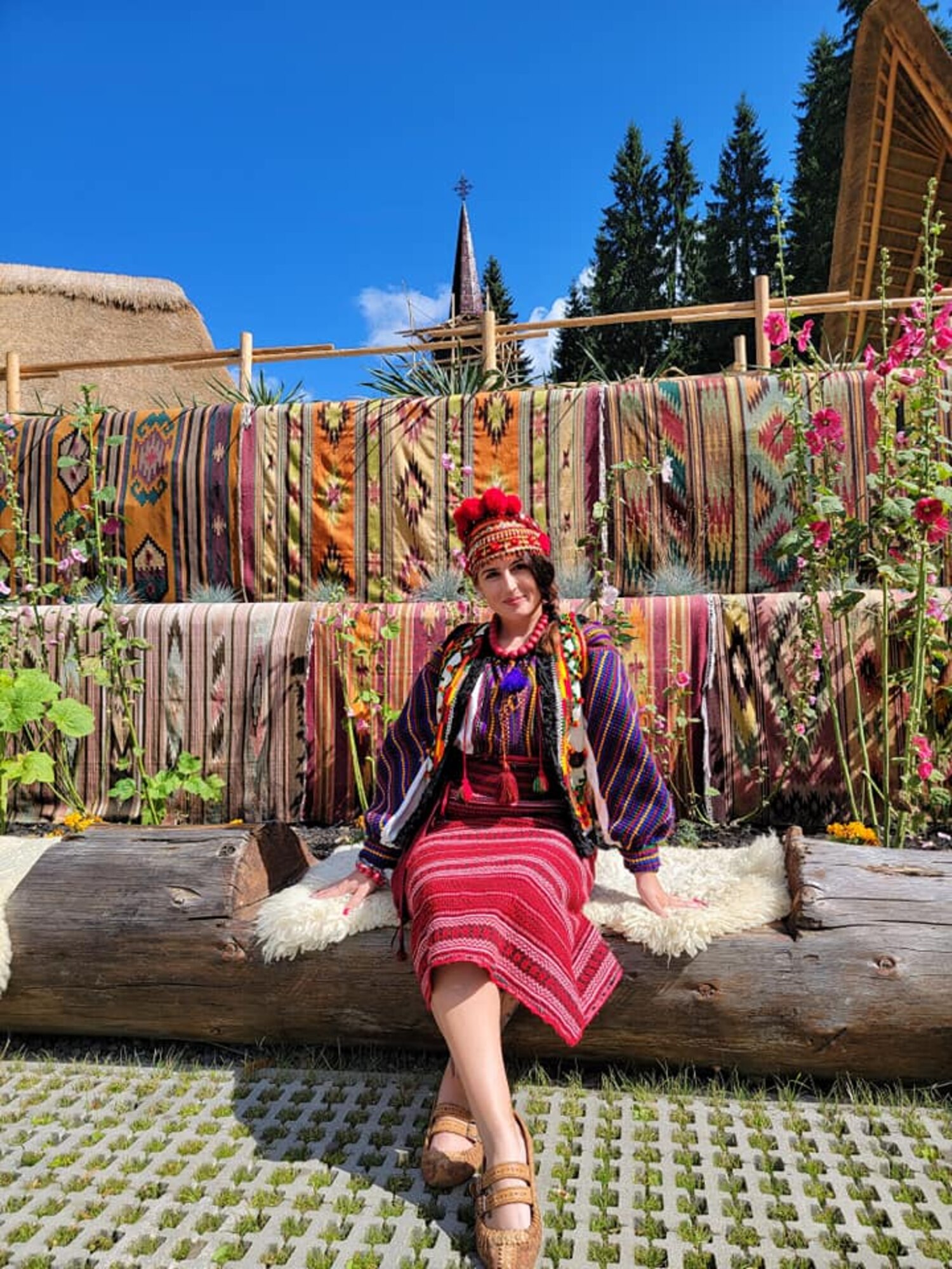Senior Airman Viktoria Senkiv, a fireteam member assigned to the 910th Security Forces Squadron, poses for a photo while dressed in traditional Ukrainian clothing at Hutsul Land ethnopark, Aug. 19, 2021, near Yaremcha, Ukraine.