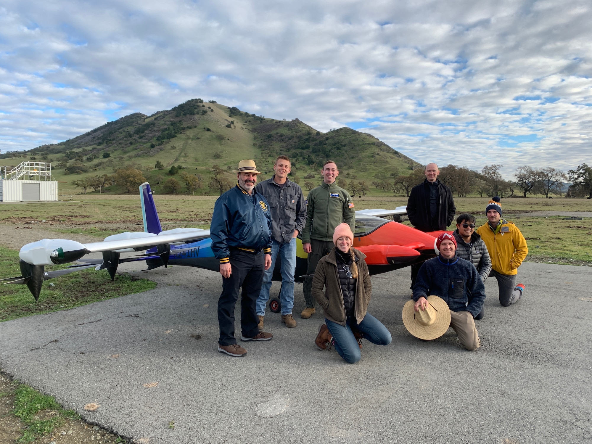 Kitty Hawk, Agility Prime, and AETC/Det62 teams jointly support syllabus development and the first Air Force flight of an eVTOL aircraft. From left to right: Dr. Stephen Ellis (AETC/Det62), Parker Downey (Kitty Hawk), Capt. Terrence McKenna (Agility Prime), Brittney Tough (Kitty Hawk), Lt. Col. Andrew Anderson (AETC/Det62), Eric Miller (Kitty Hawk), Allan Austria (Kitty Hawk), Maj. Nicholaus Carrea (AETC/Det62), Bill Gregg (Kitty Hawk), not pictured) (Courtesy photo)