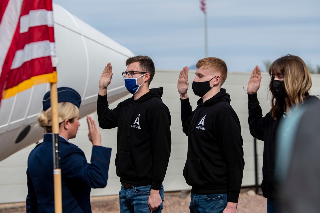 An Air Force officer conducts a swearing-in ceremony.