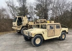 U.S. Army National Guard Soldiers with Company A, 151st Expeditionary Signal Battalion, South Carolina National Guard, stage personnel and equipment near Newberry, South Carolina, Jan. 21, 2022. The Soldiers were called in to help keep roads clear so first responders can assist people during anticipated severe winter weather.