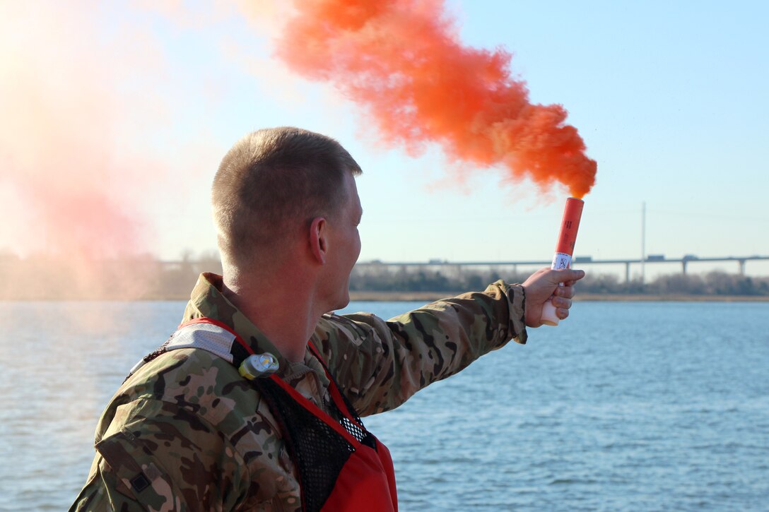 Lt. Col. Andrew Johannes, commander for the U.S. Army Corps of Engineers Charleston District, joined the district's survey crew team for flare training.  The training helps staff learn about different flares in the event a boat is sinking and signaling for help is needed.