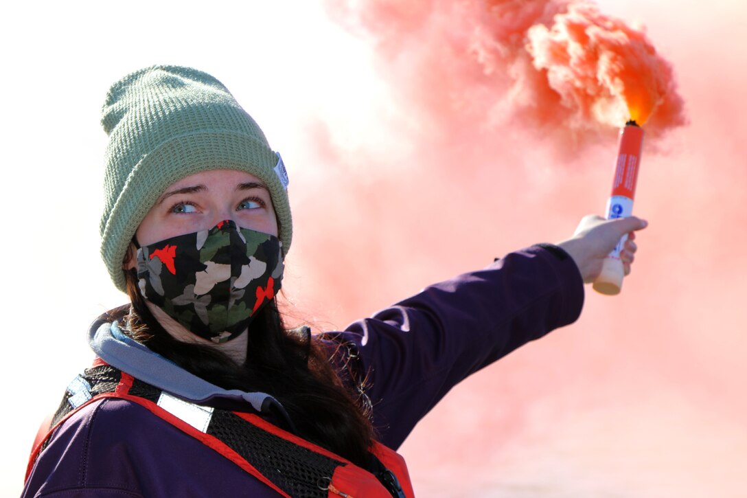 McKenzie Straub, a survey technician with the U.S. Army Corps of Engineers Charleston District, participates in flare training.  The training helps staff learn about different flares in the event a boat is sinking and signaling for help is needed.