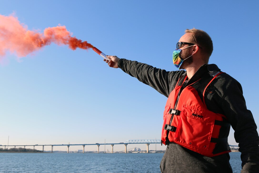 Matt Boles, an engineering technician with the U.S. Army Corps of Engineers Charleston District, participates in flare training.  The training helps staff learn about different flares in the event a boat is sinking and signaling for help is needed.