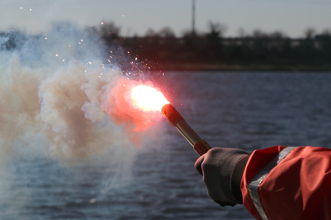 Matt Foss, chief of survey for the U.S. Army Corps of Engineers Charleston District, participates in flare training.  The training helps staff learn about different flares in the event a boat is sinking and signaling for help is needed.