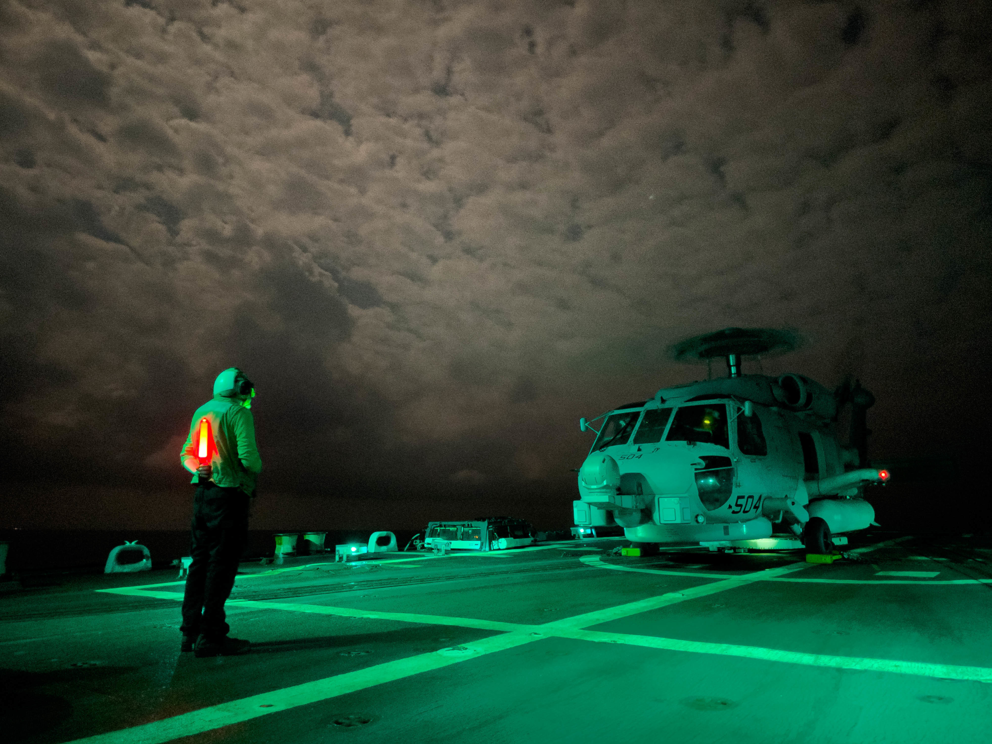 Sailors assigned to the "Vipers" of Helicopter Maritime Squadron (HSM) 48 conduct flight operations aboard the guided-missile destroyer USS Jason Dunham (DDG 109), Jan. 19.