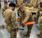 Virginia National Guard Soldiers assigned to the Portsmouth-based 2nd Squadron, 183rd Cavalry Regiment, 116th Infantry Brigade Combat Team conduct pre-mission checks on equipment Jan. 21, 2022, in Portsmouth, Virginia, to prepare for possible winter storm response operations.