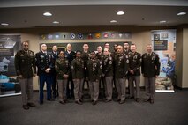 Soldiers stand together during ceremony.